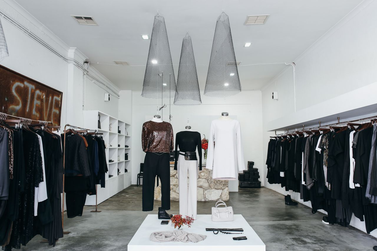 Chic boutique with elegant clothing display and stylish interior design.